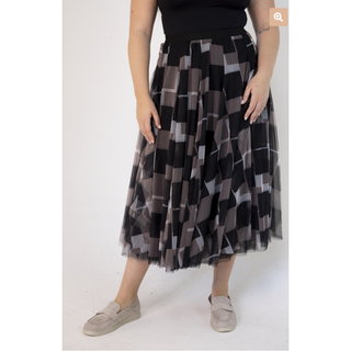 Our Sophia Tulle Skirt in a striking abstract square pattern, creating a unique and fashion-forward statement piece. The skirt features a classic black base color with an all-over black square print, with a contrasting red and white lines making it a versatile addition to any wardrobe.