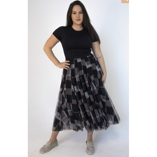 Our Sophia Tulle Skirt in a striking abstract square pattern, creating a unique and fashion-forward statement piece. The skirt features a classic black base color with an all-over black square print, with a contrasting red and white lines making it a versatile addition to any wardrobe.