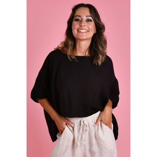 The Amalfi Linen Top is a stylish One Size and versatile piece designed with fashion-conscious individuals in mind. Crafted from 100% linen, it offers both comfort and breathability, making it ideal for various weather conditions. Shop Now at Love Moi Boutique.