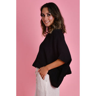 The Amalfi Linen Top is a stylish One Size and versatile piece designed with fashion-conscious individuals in mind. Crafted from 100% linen, it offers both comfort and breathability, making it ideal for various weather conditions. Shop Now at Love Moi Boutique.