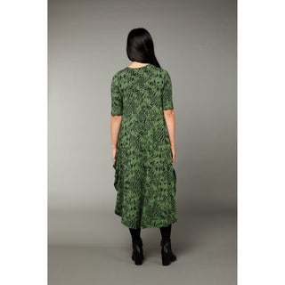 The Tiger print green color tri dress made from micro modal air fabric is designed to be ultra-soft and stretchy, providing a comfortable and flattering fit for the wearer. The dress features a classic rounded neckline and half-length sleeves, making it appropriate for a variety of occasions. 