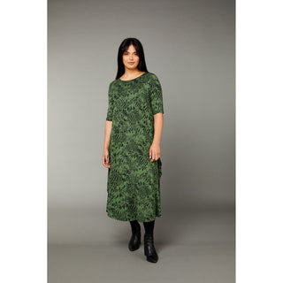 The Tiger print green color tri dress made from micro modal air fabric is designed to be ultra-soft and stretchy, providing a comfortable and flattering fit for the wearer. The dress features a classic rounded neckline and half-length sleeves, making it appropriate for a variety of occasions. 