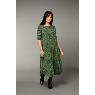 The Tiger print green color tri dress made from micro modal air fabric is designed to be ultra-soft and stretchy, providing a comfortable and flattering fit for the wearer. The dress features a classic rounded neckline and half-length sleeves, making it appropriate for a variety of occasions. 