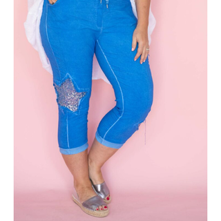 Discover yourself why our Italian Star Jean style pants are one of our bestsellers! Comfortable and chic you will always feel on trend and shine bright in confidence along with the added bling of the design featured sequined stars.  These pants have plenty of stretch and can be worn either tight fitting by sizing down or size up for a baggier casual jogging style depending on your personal size and preference.