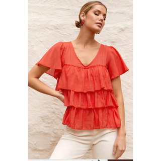 Easy to wear red women's top in a fabric mix of Bamboo/Cotton and Tencel you will make a memorable statement whatever the occasion. When you need to add a bit of Za Za to your outfit go dramatic in our striking Za Za Fril Top in red. Shop online now at Love Moi Boutique.